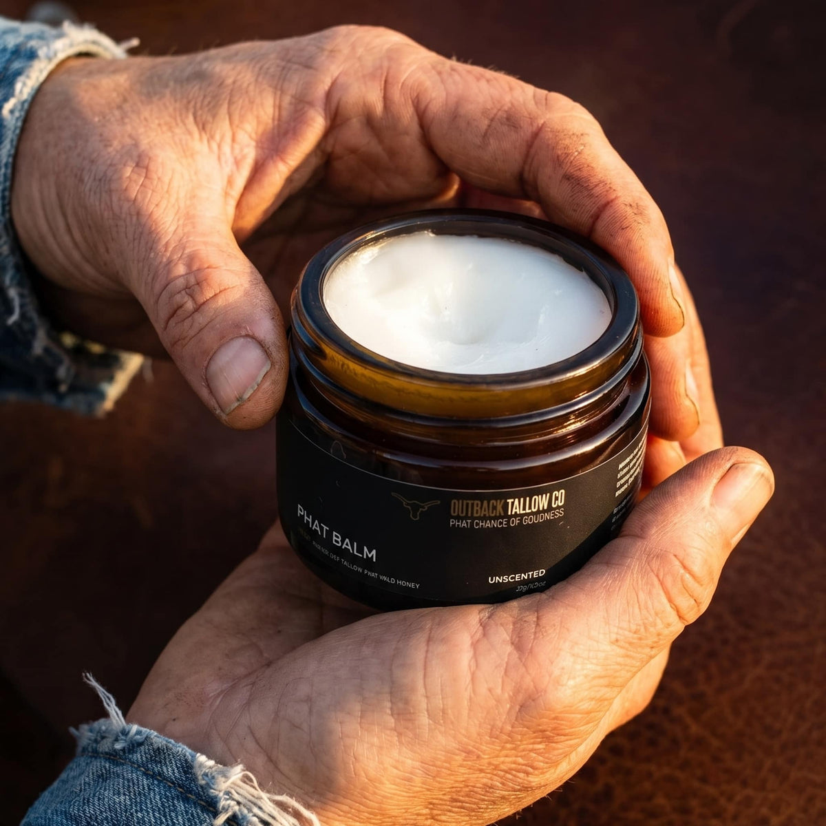 PHAT BALM grass fed beef tallow balm being applied to dry cracked hands natural skincare for eczema psoriasis sensitive and reactive skin no synthetic fragrance fast dispatch Australia wide free shipping over $100 Outback Tallow Co Townsville Queensland Australia