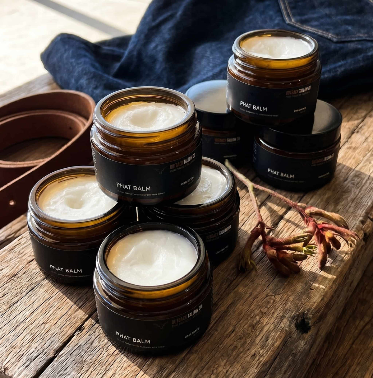 PHAT BALM grass fed beef tallow balm multiple amber glass jars grouped together concentrated natural skincare for dry cracked eczema psoriasis and sensitive skin no synthetic fragrance fast dispatch Australia wide free shipping over $100 Outback Tallow Co Townsville Queensland Australia