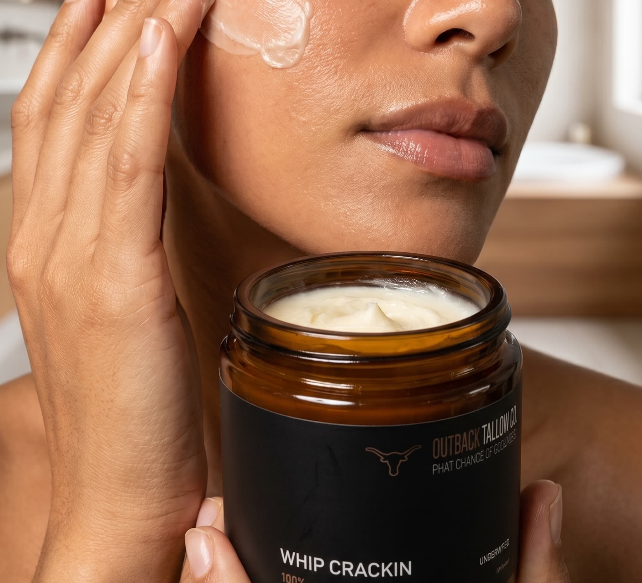 Woman applying outback tallow co&