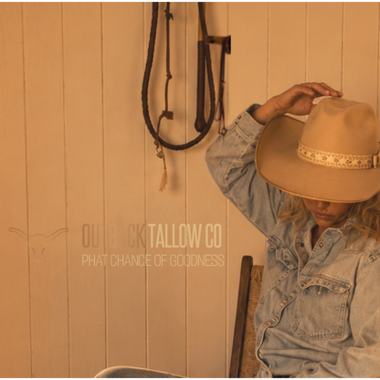 Founder of Outback Tallow Co. in a warm country setting representing Bootin&