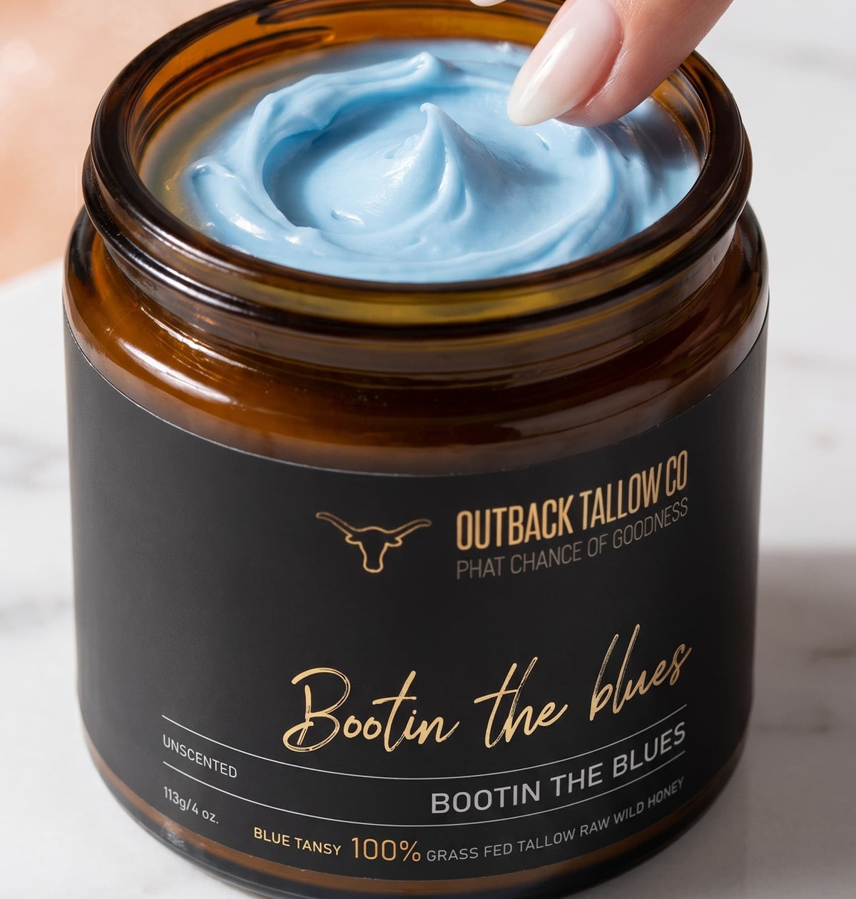 Bootin the Blues whipped blue tansy grass-fed beef tallow balm overhead open jar showing blue texture for sensitive skin eczema psoriasis and rosacea natural Australian skincare no synthetic fragrance fast shipping Australia wide – Outback Tallow Co Townsville Queensland Australia