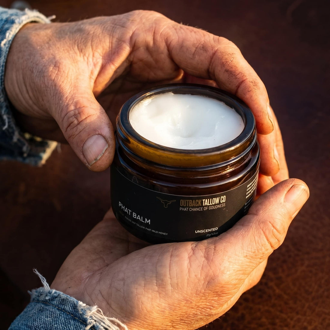 PHAT BALM grass fed beef tallow balm being applied to dry cracked hands natural skincare for eczema psoriasis sensitive and reactive skin no synthetic fragrance fast dispatch Australia wide free shipping over $100 Outback Tallow Co Townsville Queensland Australia